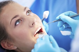 Close-up of female patient having dental inspection